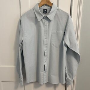 New Balance Men's Casual Light Blue Lifestyle Shirt
